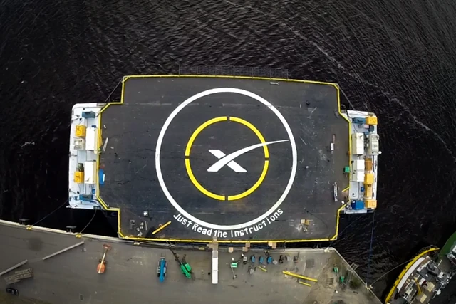 An archival photograph shows Just Read the Instructions, a different SpaceX drone ship. This is platform context, not the vessel used for B1088's October recovery.