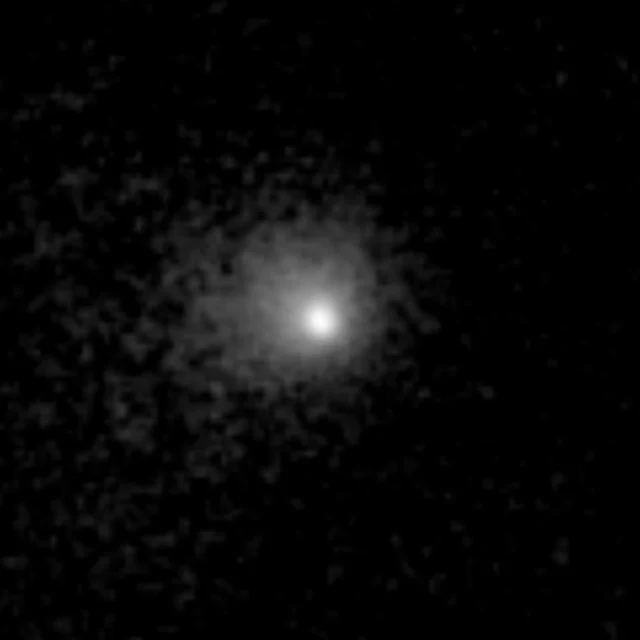 Euclid's real eight-exposure composite shows the bright unresolved comet surrounded by a diffuse coma