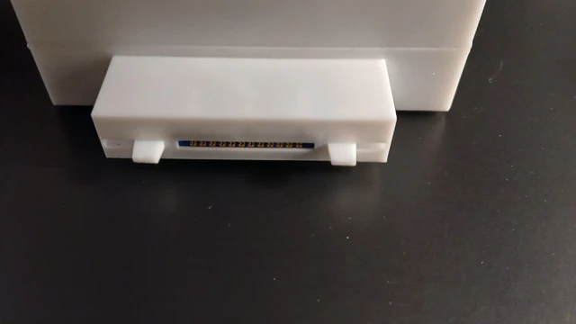 The cartridge connector inside the build is a real electrical interface. Its mechanical support matters as much as the opening in the case.